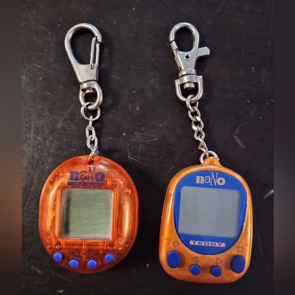 Vintage 1997 Nano Virtual Pet Keychains - Orange and Blue